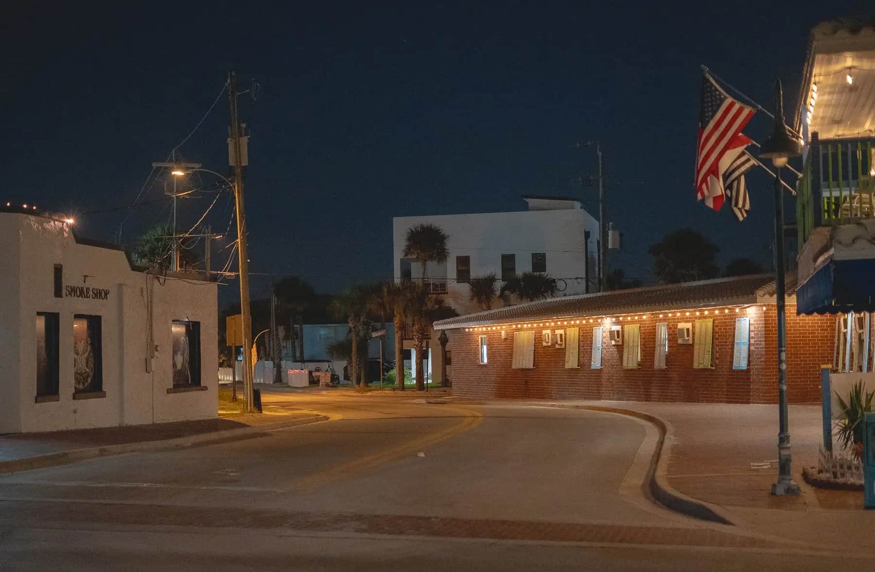 Quiet beachside street corner at night in New Smyrna Beach